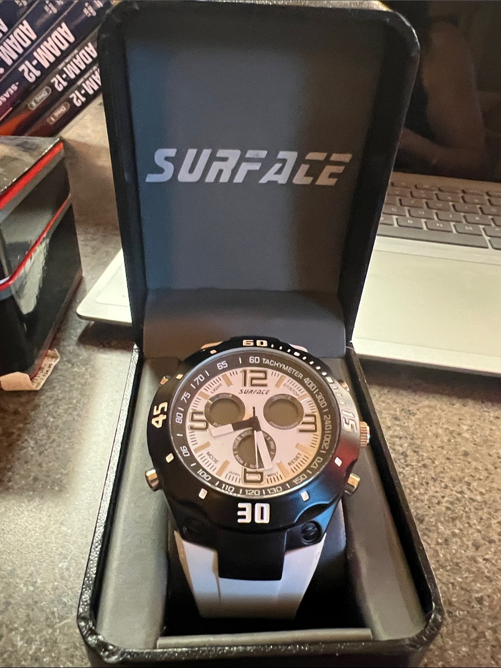 Men’s Black and White Sport Watch - new in box. 5 year warranty included in box.